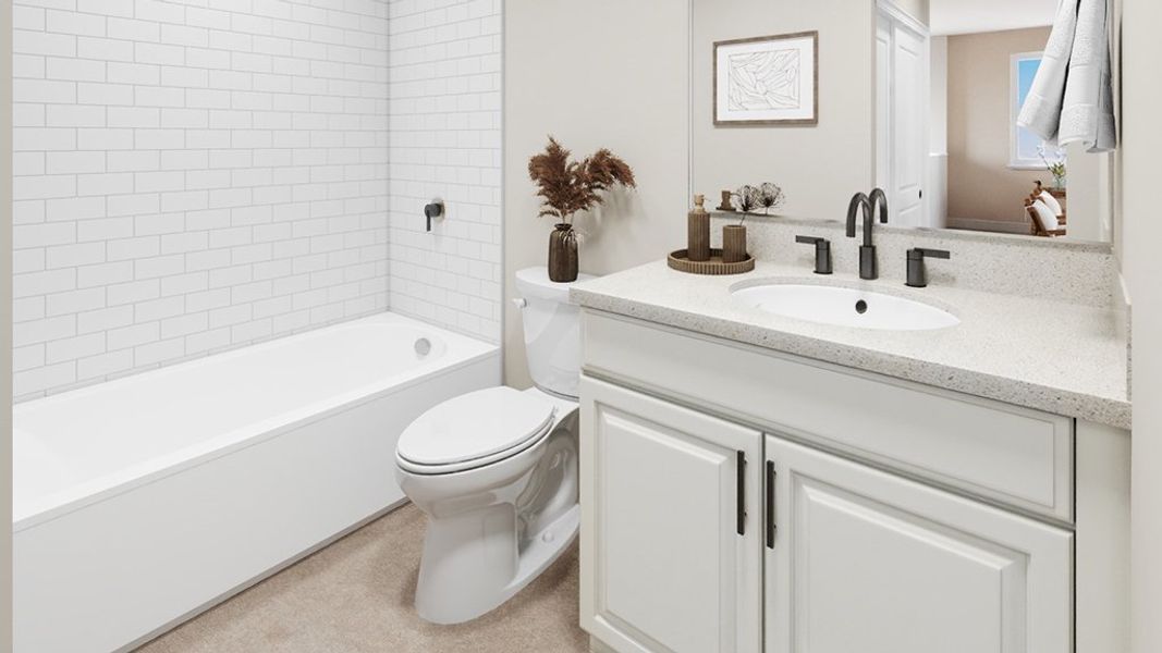 Furnished interior view inside a new home in Esplanade at Kingston, Estero (Image 15).