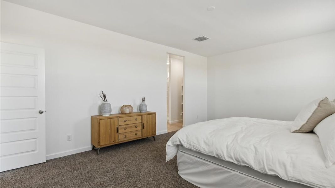 Representative furnished interior of a home built from the Justin by D.R. Horton in Sorrento, Maricopa (Image 17).