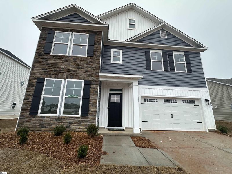 Front exterior of a new home in Shiloh Trail, Wellford, SC, highlighting curb appeal (Image 24).