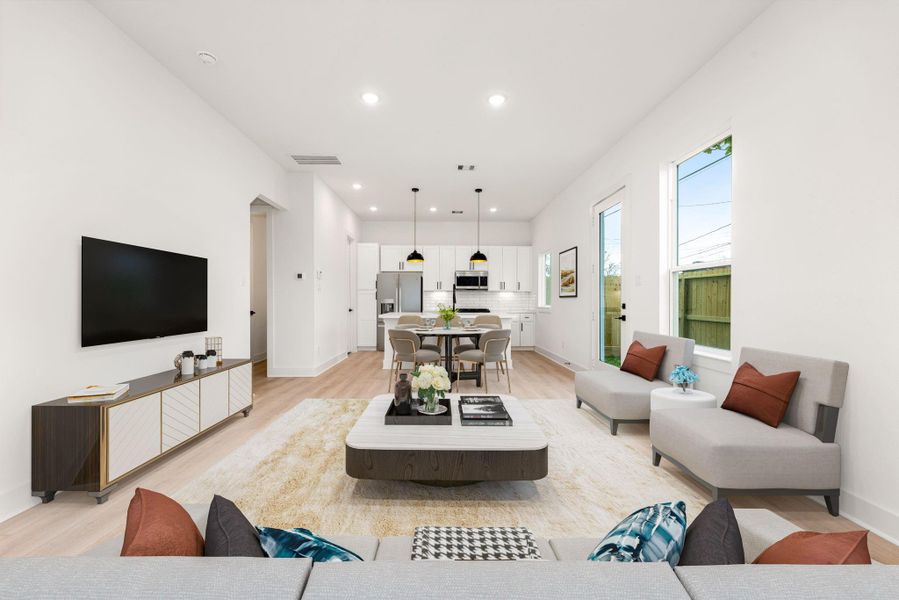 Step into modern elegance with this open-concept living space, where sleek design meets effortless comfort. The bright, airy interior is enhanced by recessed lighting, large windows, and a seamless flow between the kitchen, dining, and living areas. The gourmet kitchen boasts crisp white cabinetry, quartz countertops, stainless steel appliances, and a spacious island—perfect for entertaining. Step into modern elegance with this open-concept living space, where sleek design meets effortless comfort. The bright, airy interior is enhanced by recessed lighting, large windows, and a seamless flow between the kitchen, dining, and living areas. The gourmet kitchen boasts crisp white cabinetry, quartz countertops, stainless steel appliances, and a spacious island—perfect for entertaining.