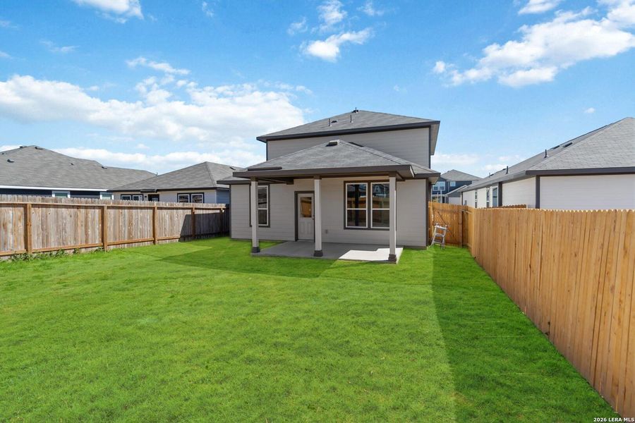 Exterior details and patio area of a home in Red Hawk Landing, San Antonio (Image 3).