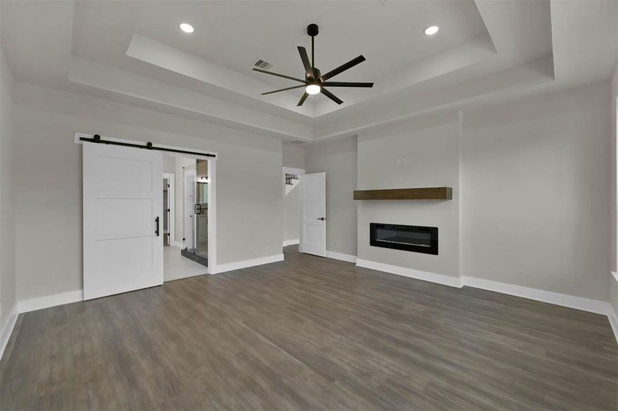 Similar Master Bedroom with Barn Door Built by TX Best Home Builders