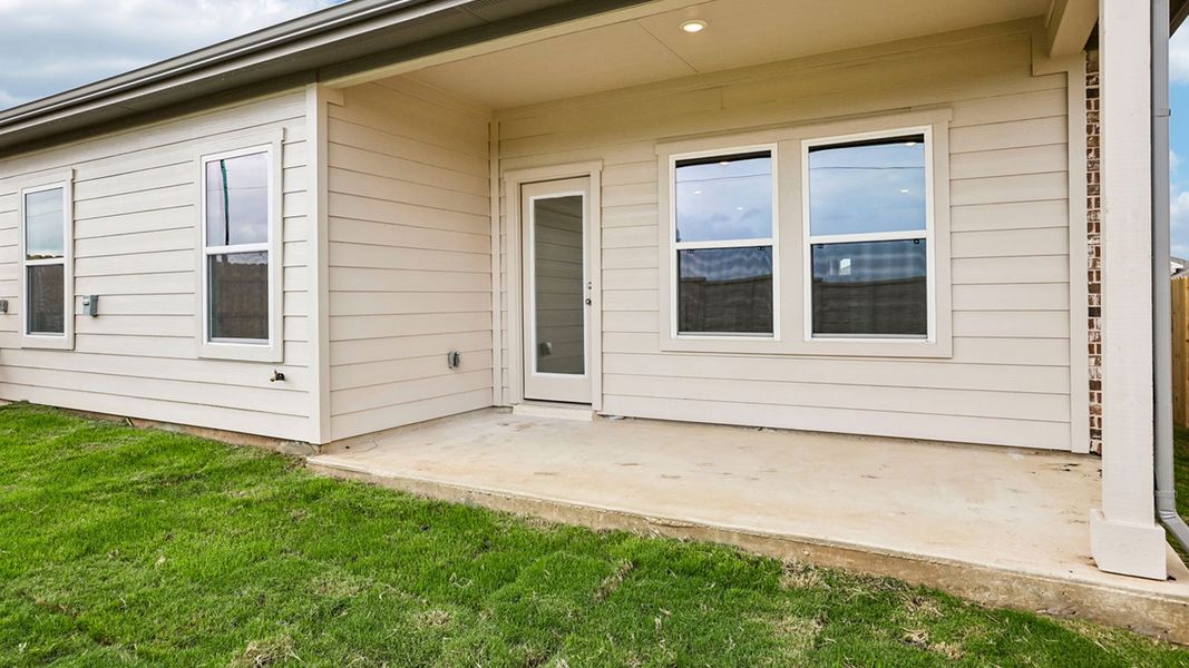 Exterior details and patio area of a home in Briarwood, Elgin (Image 3).
