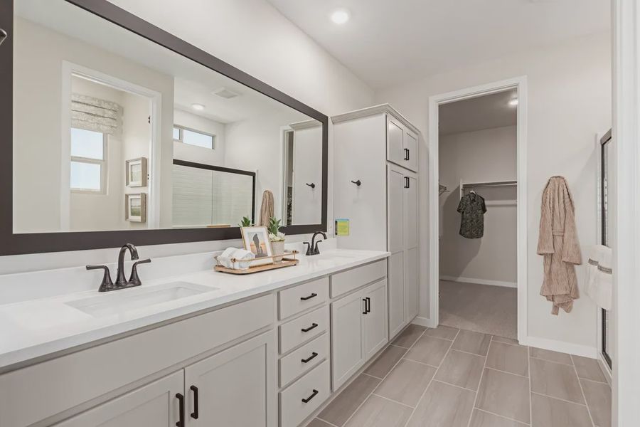 Representative furnished interior of a home built from the Granite Vista Avanti - Plan 2028 by Elliott Homes in Avanti at Granite Vista, Waddell (Image 13).