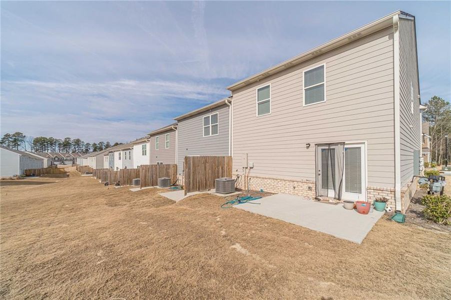 Exterior details and patio area of a home in , Buford (Image 3). Exterior details and patio area of a home in , Buford (Image 3).