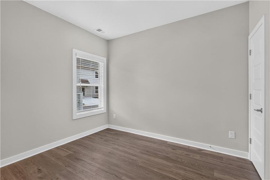 Spacious, unfurnished interior of a new home in The Cottages at East Lanier, Fayetteville (Image 9).