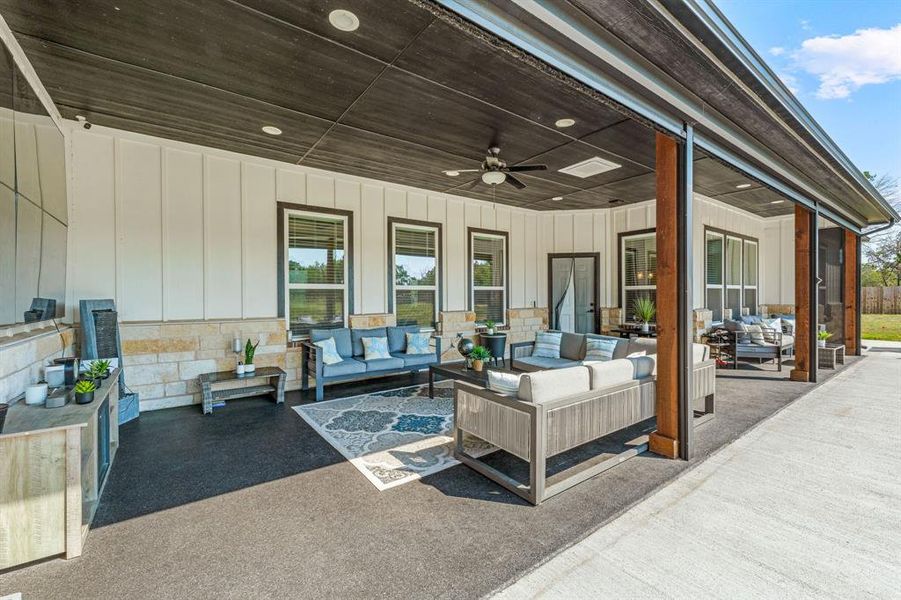 View of patio / terrace with an outdoor hangout area and ceiling fan View of patio / terrace with an outdoor hangout area and ceiling fan