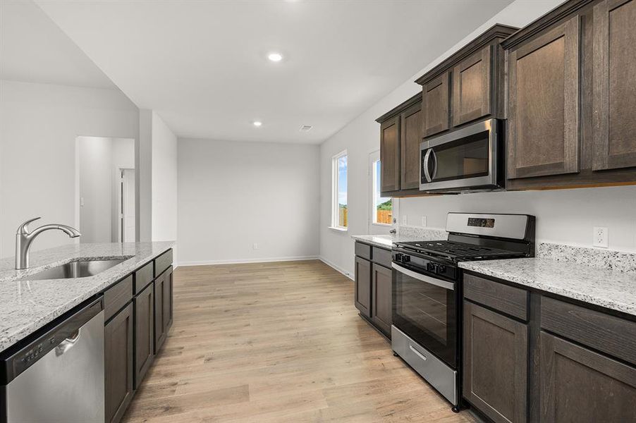 Furnished interior view inside a new home in Patriot Estates, Venus (Image 6).
