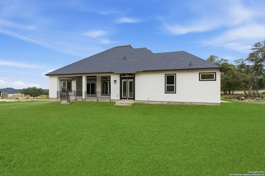 Exterior details and patio area of a home in Heimer Estates at Garden Ridge, San Antonio (Image 28).