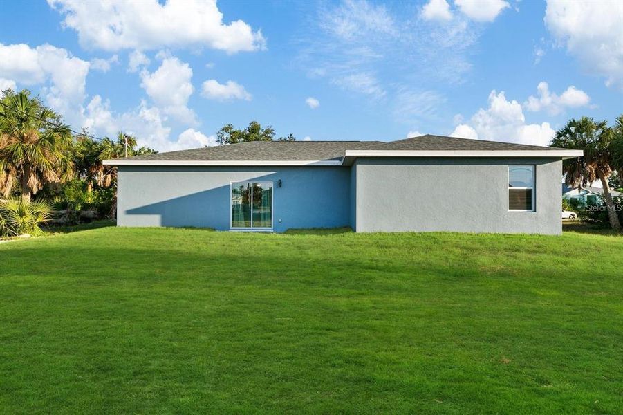 Exterior details and patio area of a home in , Port Charlotte (Image 18).