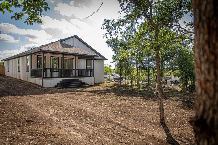 Front exterior of a new home in , Dale, TX, highlighting curb appeal (Image 13). Front exterior of a new home in , Dale, TX, highlighting curb appeal (Image 13).