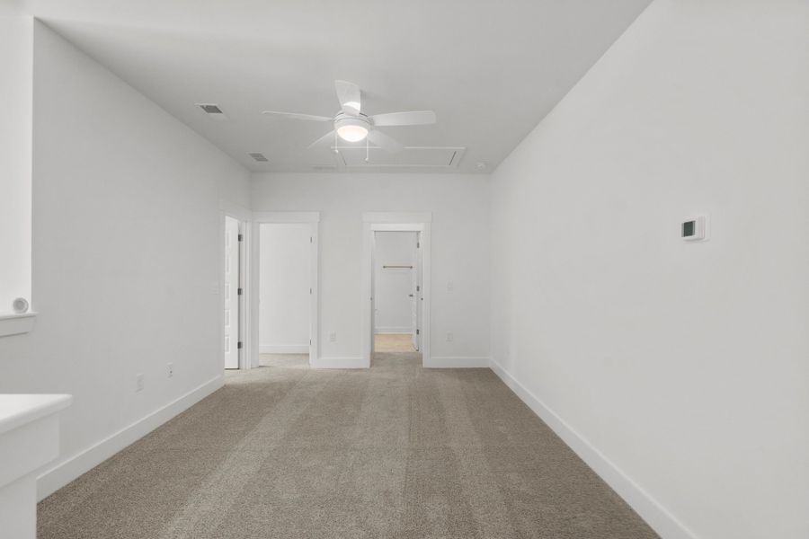 Spacious, unfurnished interior of a new home in Long Bay Golf Club, Longs (Image 31).