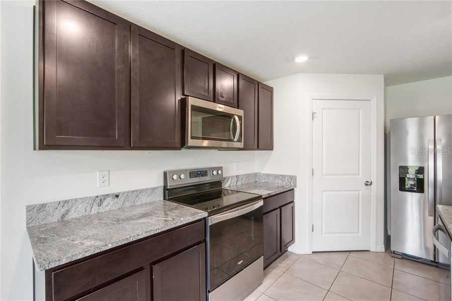 Furnished interior view inside a new home in Abbott Park, Zephyrhills (Image 11).