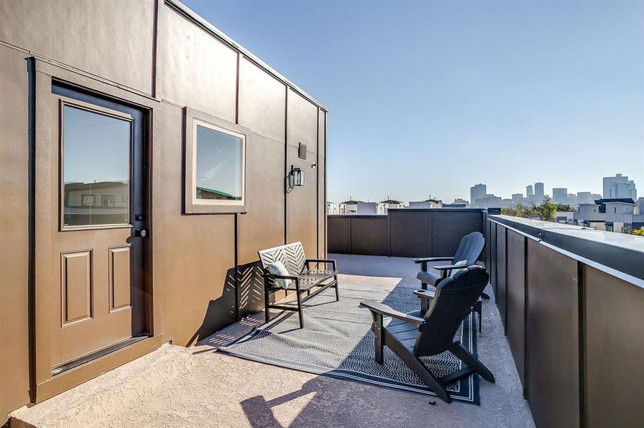 Spacious rooftop deck perfect for entertaining or relaxing under the city lights. Spacious rooftop deck perfect for entertaining or relaxing under the city lights.