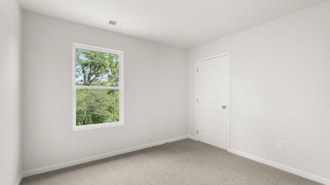 Spacious, unfurnished interior of a new home in Liberty Crossing, Braselton (Image 32).