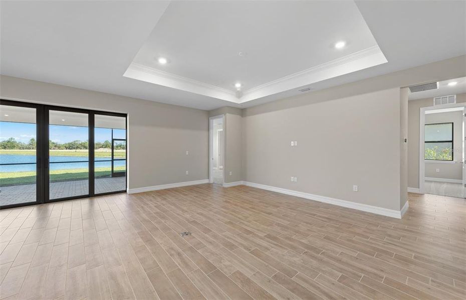 Spacious, unfurnished interior of a new home in The Strand at Cedar Grove, North Port (Image 37).