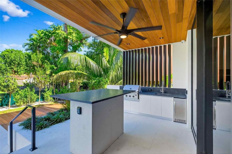 Exterior details and patio area of a home in , Miami Beach (Image 23). Exterior details and patio area of a home in , Miami Beach (Image 23).