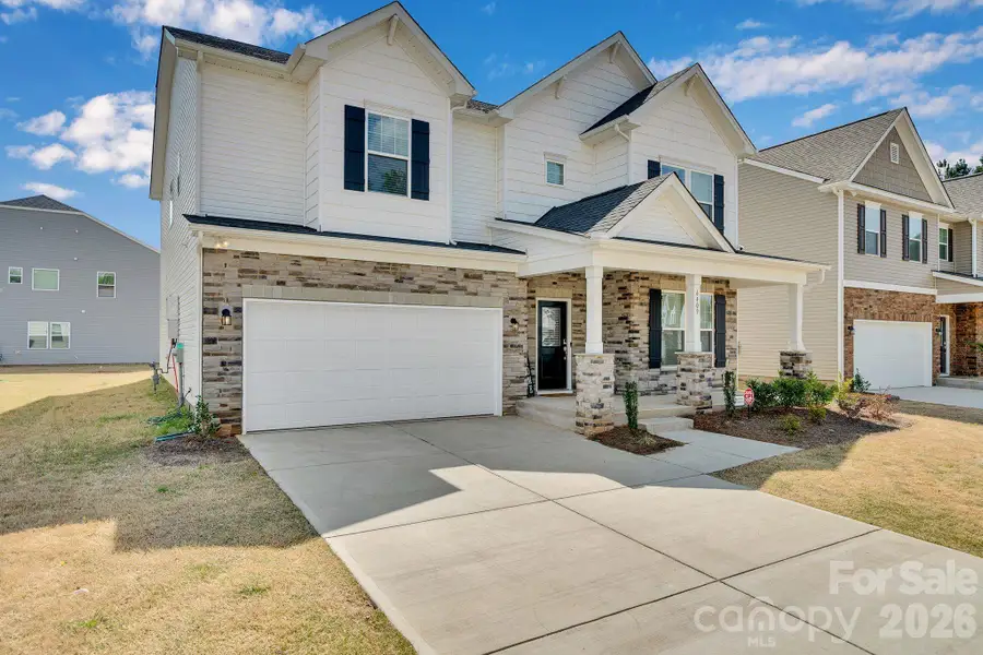 Front exterior of a new home in Clairmont, Charlotte, NC, highlighting curb appeal (Image 2). Front exterior of a new home in Clairmont, Charlotte, NC, highlighting curb appeal (Image 2).