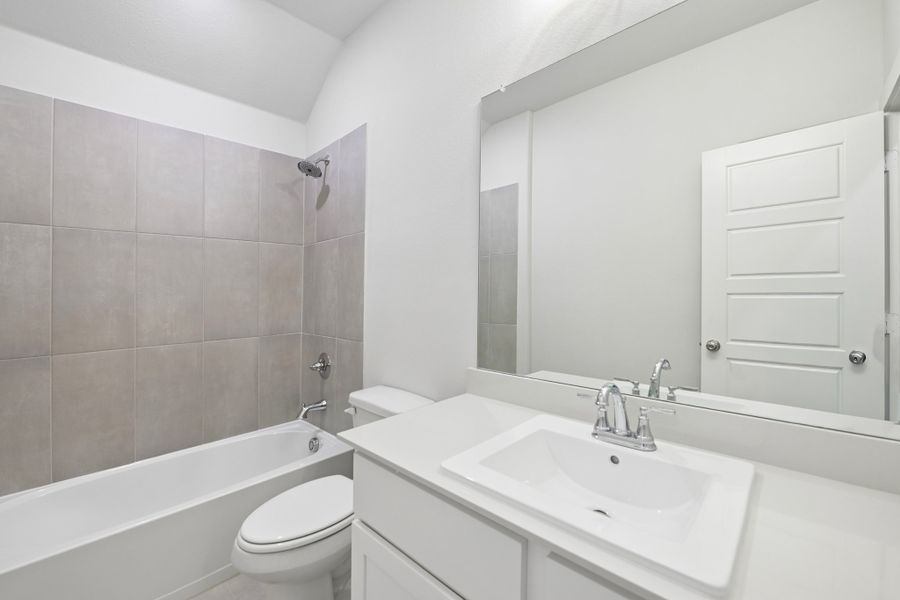 Secondary Bathroom in the Heisman home plan by Trophy Signature Homes Secondary Bathroom in the Heisman home plan by Trophy Signature Homes