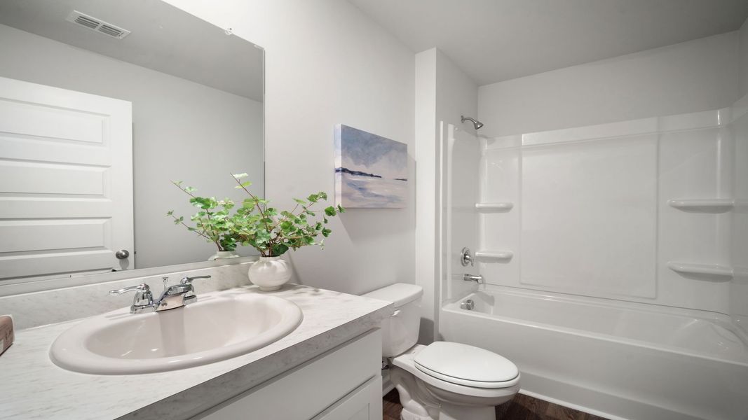 Furnished interior view inside a new home in The Groves at Bees Creek, Ridgeland (Image 26).
