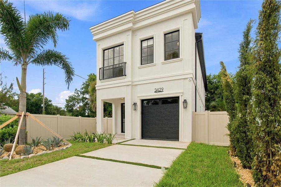 Front exterior of a new home in , Tampa, FL, highlighting curb appeal (Image 33).