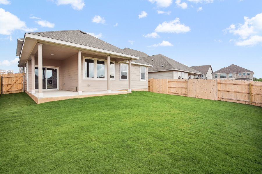 Representative exterior photo of a completed home built from the Blake by Ashton Woods in Rolling Glen, Hutto, TX (Image 27).