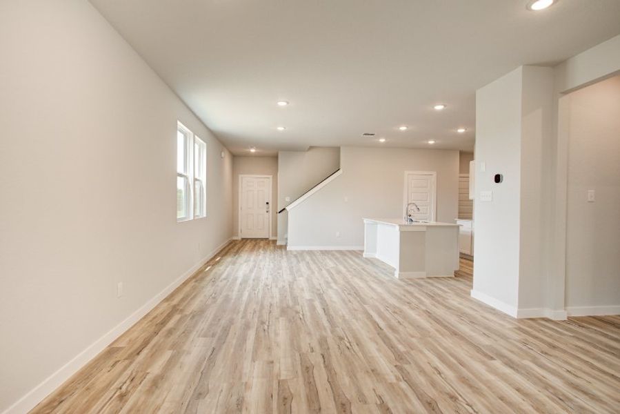 A room with white walls and a wood floor. A room with white walls and a wood floor.