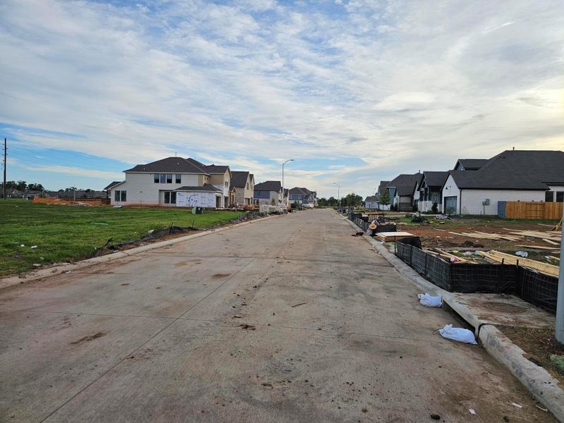 Front exterior of a new home in , Fulshear, TX, highlighting curb appeal (Image 18).