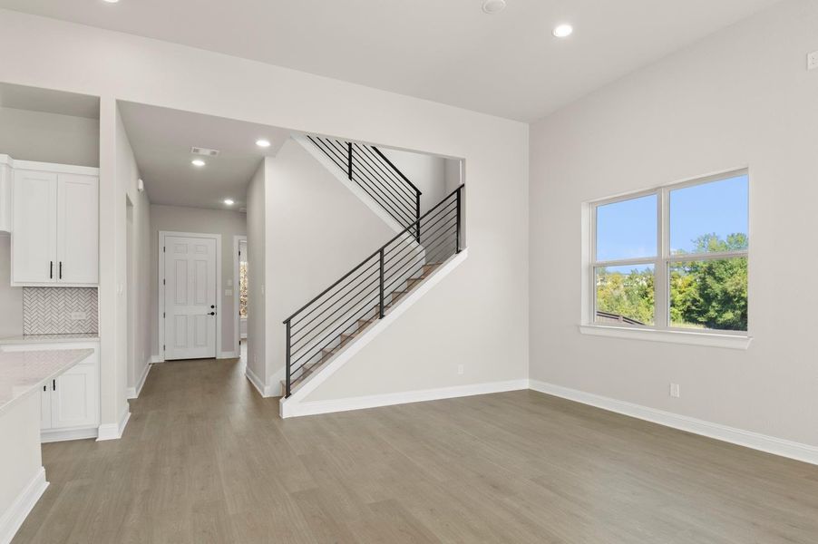 Foyer entrance featuring recessed lighting, light wood-style flooring, and stairway Foyer entrance featuring recessed lighting, light wood-style flooring, and stairway
