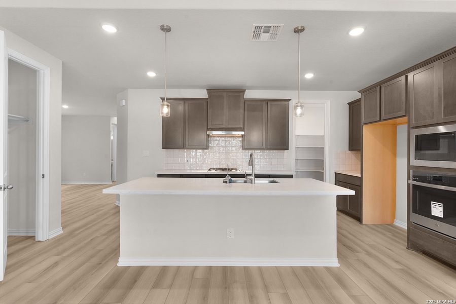 Furnished interior view inside a new home in Meyer Ranch - Enclave, New Braunfels (Image 6).