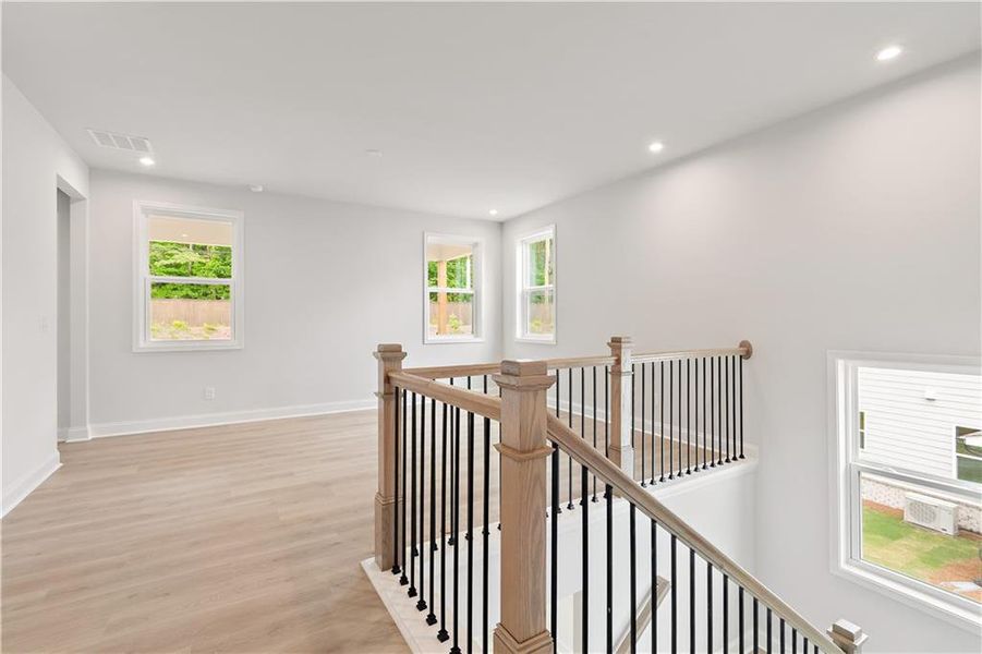 Spacious, unfurnished interior of a new home in The Paddocks at Doc Hughes, Buford (Image 24).