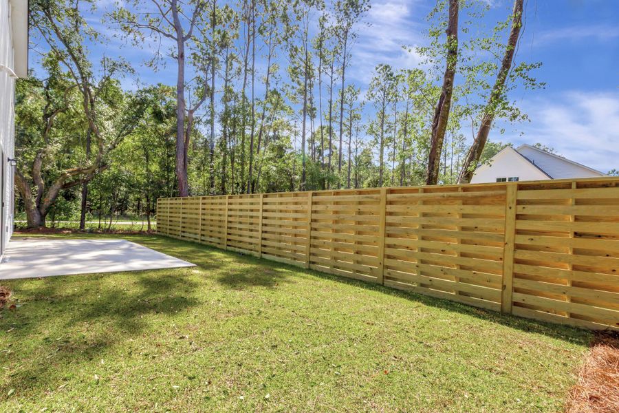 Exterior details and patio area of a home in , Awendaw (Image 1).