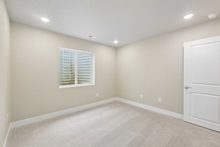 Spacious, unfurnished interior of a new home in The Trails at Aspen Ridge, Colorado Springs (Image 59).