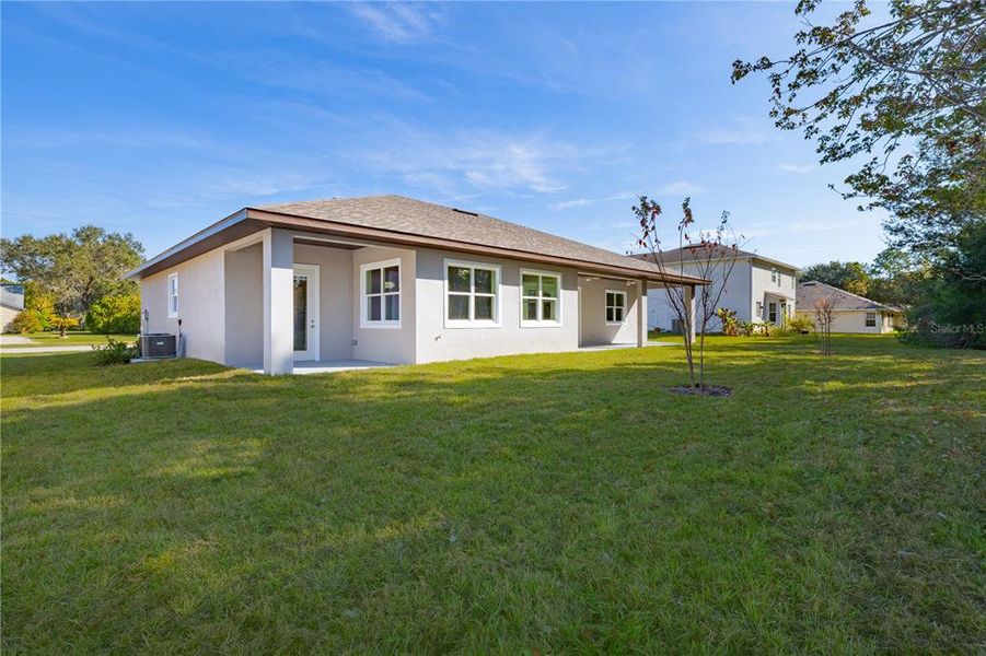 Exterior details and patio area of a home in , Palm Coast (Image 28).