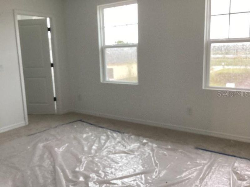 In-progress construction of a new home in Ellington Traditional, St. Cloud, FL (Image 23).