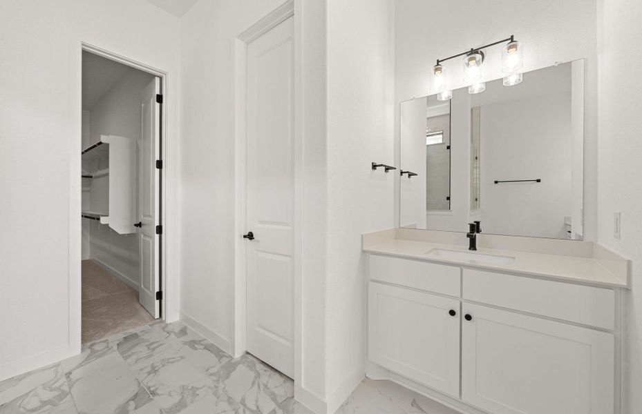 Representative furnished interior of a home built from the Dobbin by Pulte Homes in 6 Creeks, Kyle (Image 9).