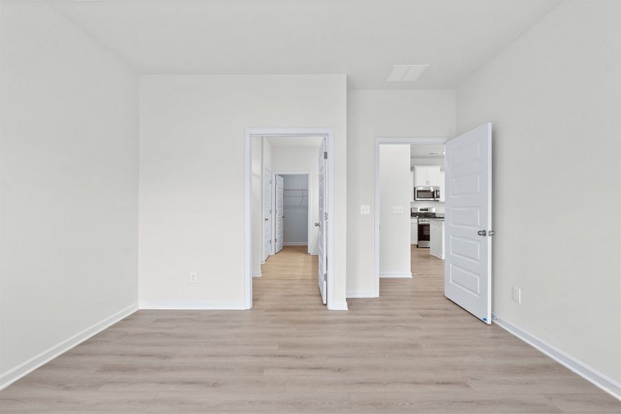 The Dove- Primary Suite. Home under construction, photo used for illustrative purposes only, colors and options will vary.