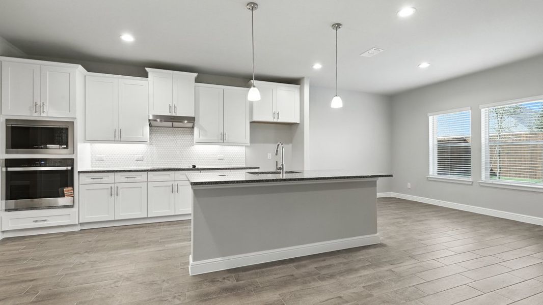 Representative furnished interior of a home built from the Bridge City by D.R. Horton in Retta Estates, Mansfield (Image 4).