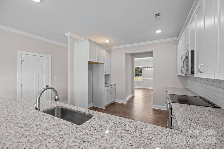 Furnished interior view inside a new home in , Monroe (Image 12).
