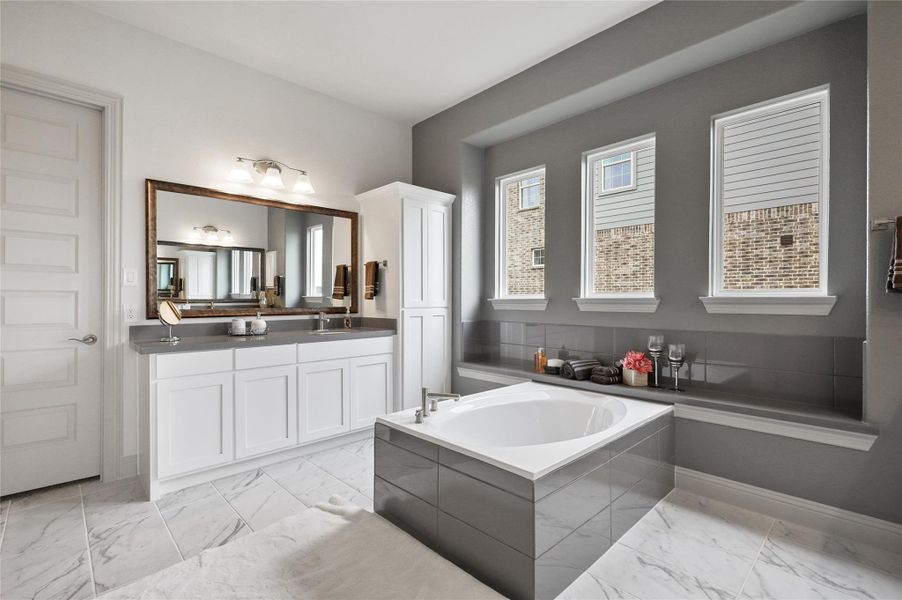 Model home photos of similar floorplans, not pictures of actual home.