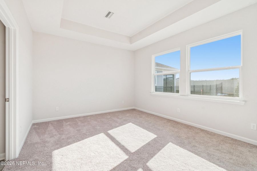 Spacious, unfurnished interior of a new home in Tributary 50', Yulee (Image 23).