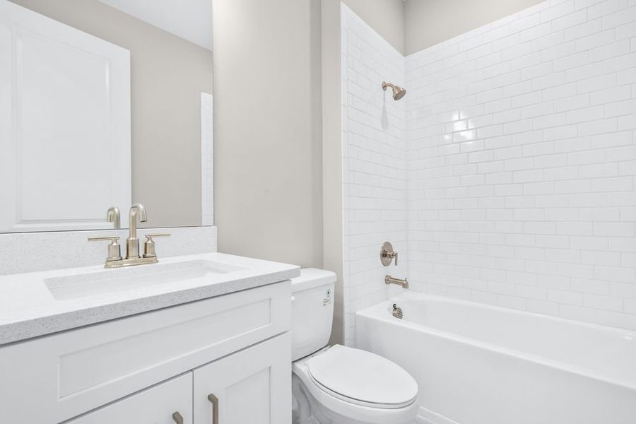 Furnished interior view inside a new home in Esplanade at Starling, Punta Gorda (Image 5).