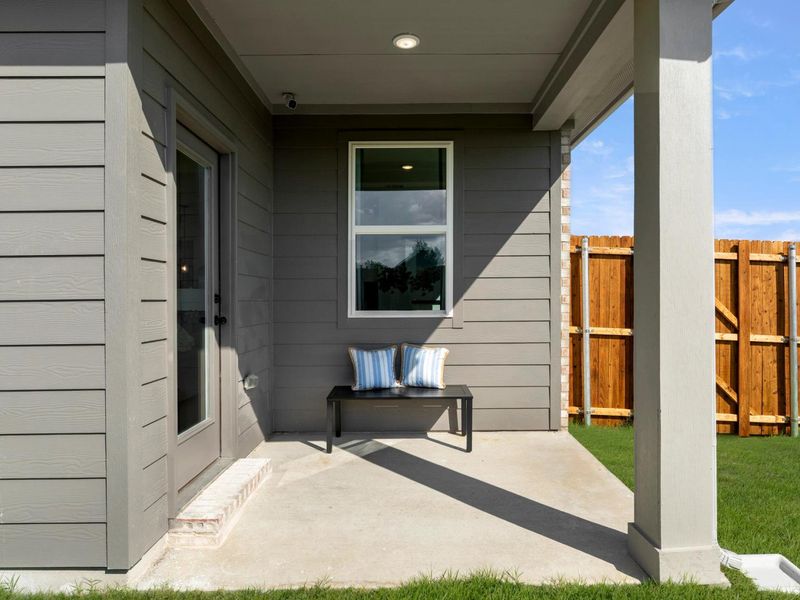 Exterior details and patio area of a home in Mercer Meadows, Royse City (Image 2).