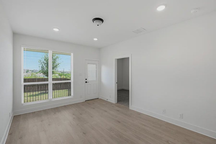 Representative unfurnished interior of a home built from the Athena by Chesmar Homes in Prominence Urban, San Antonio (Image 33).
