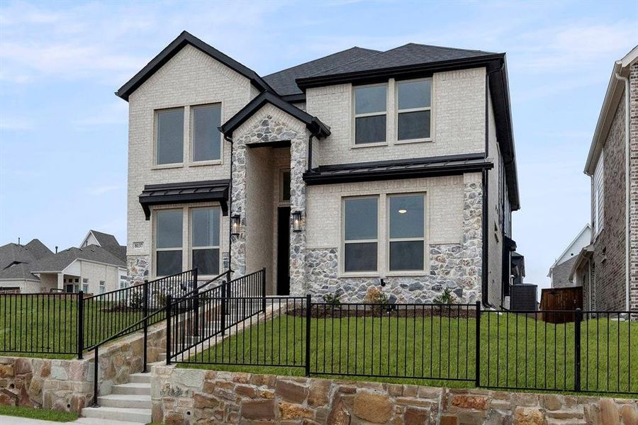 Front exterior of a new home in Trails at Cottonwood Creek, Rowlett, TX, highlighting curb appeal (Image 21).