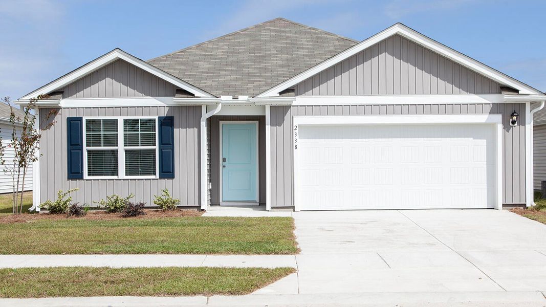 Front exterior of a new home in Cedar Hill Landing, Navassa, NC, highlighting curb appeal (Image 1). Front exterior of a new home in Cedar Hill Landing, Navassa, NC, highlighting curb appeal (Image 1).