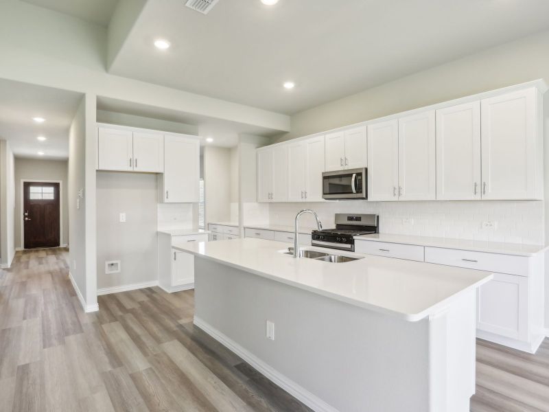 Furnished interior view inside a new home in Lakehaven - Premier Series, Farmersville (Image 5).