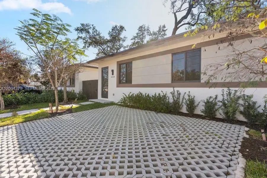 Exterior details and patio area of a home in , Miami (Image 3).