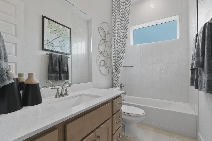 Representative furnished interior of a home built from the Maddy by Chesmar Homes in Lariat, Liberty Hill (Image 12).