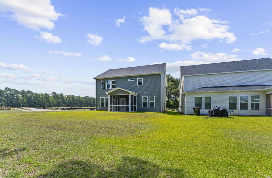 Exterior details and patio area of a home in The Groves of Berkeley, Moncks Corner (Image 26).